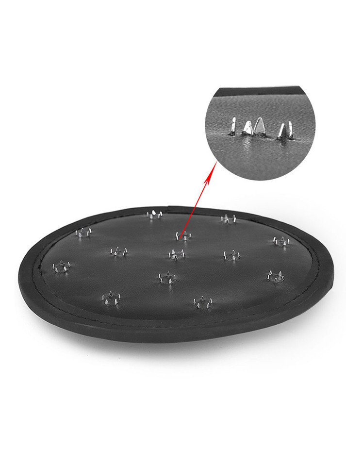 Close-up of the triangular spikes arranged on the paddle’s surface for enhanced sting.