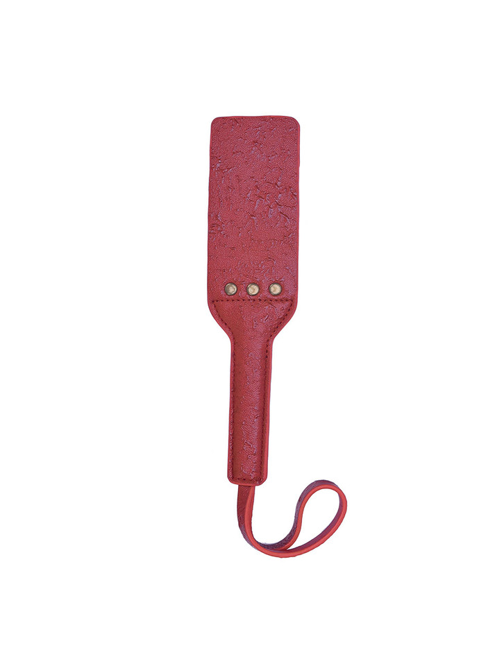 Full view of the red real leather double-layer paddle with a textured finish.