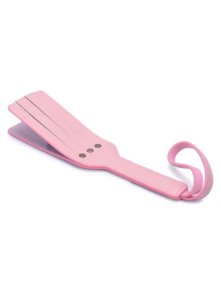 Full view of the pink real leather double-layer paddle with a textured finish.