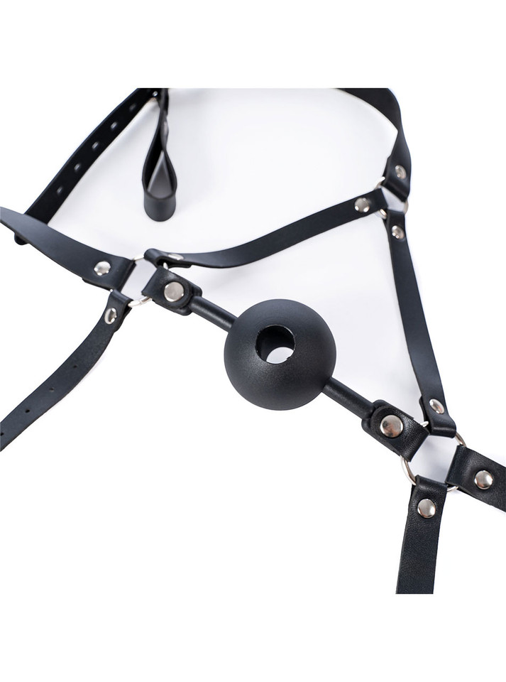 Close-up of the 5cm black silicone ball with center hole for candle play.