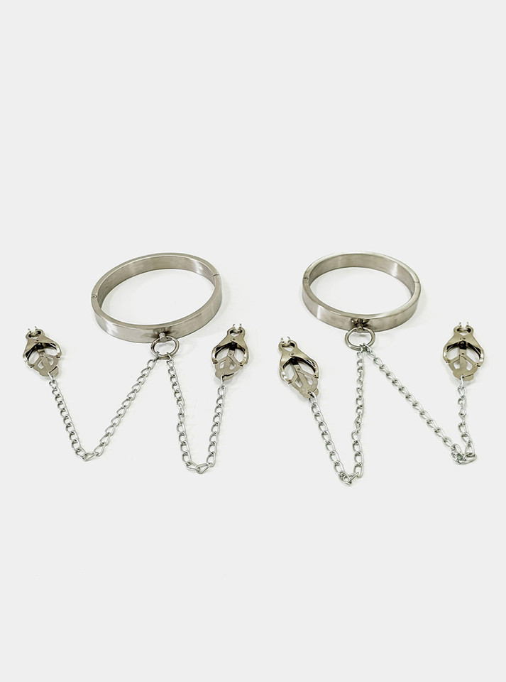 Slave collar with nipple clamps, highlighting the sturdy construction and polished steel finish.