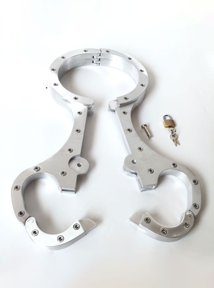 Open Metal Bondage Cangue with padlock and key accessories.