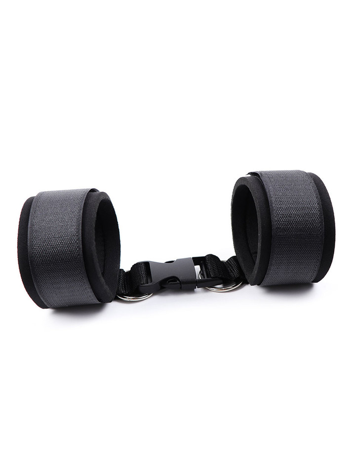 Pair of adjustable Velcro wrist or ankle cuffs with metal D-rings