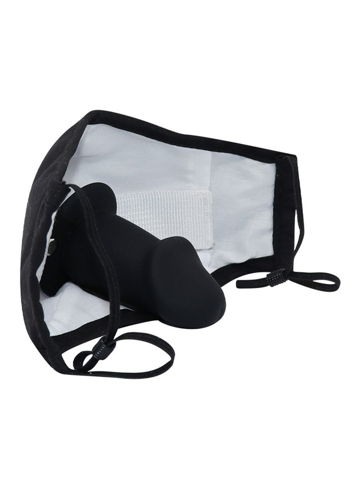 Side view of the restraint mask showing adjustable straps.