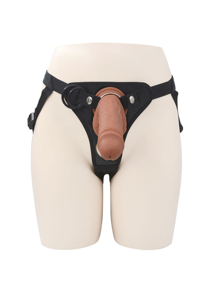 Front close-up of thick straight dildo attached to harness