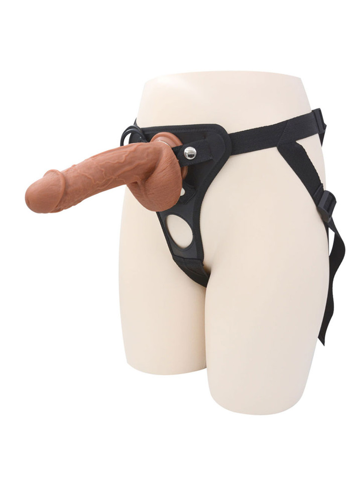 Strap-on with curved brown dildo attached to black harness