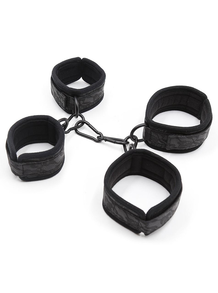 Close-up of padded cuffs with metal hardware