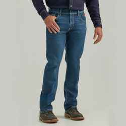 Men's Midstone Wrangler FR Retro Slim Boot Jean, showcasing a slim fit, boot cut, classic five-pocket styling with distinct hip pocket embroidery and a patch watch pocket, an arc-resistant button waistband closure, and a prominent safety orange outside ID, crafted from 98% Cotton and 2% Spandex.