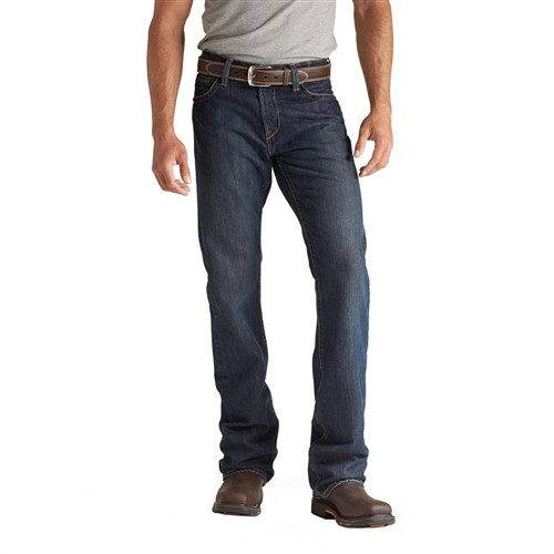Ariat Work FR Men's M4 Shale Flame Resistant jeans, dark wash with hand-sanding and tacking for a worn-in appearance. These 13 oz. FR cotton denim jeans feature a relaxed fit, boot cut leg opening, extra-deep front pockets, and reinforced belt loops.