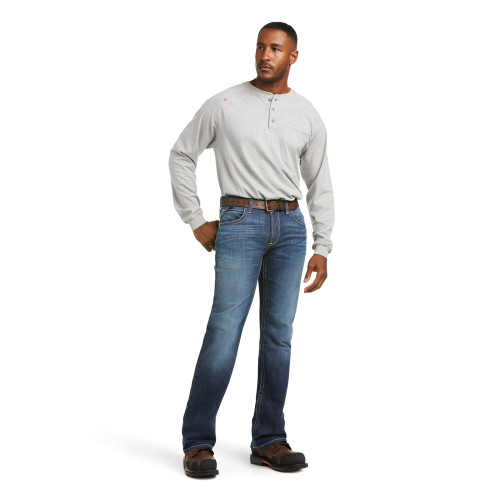 Ariat FR M5 Straight DuraStretch Truckee Stackable Straight Leg Jeans made from 13 oz. DuraStretch ring-spun denim. The jeans have a slim fit through the seat and thigh, a low-rise waist, a straight leg opening designed to stack over boots, and feature stitched back pockets.