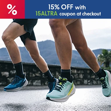 graphic, close-up of two runners' legs mid-stride on a paved road with a stone wall and mountains in the background, text, Extra 15% OFF ALTRA All non-sale Items with coupon 15ALTRA at checkout