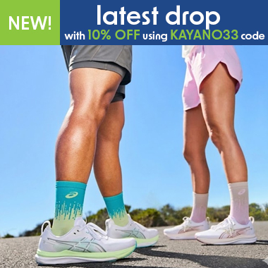 Graphic, two pairs of legs wearing colorful socks and ASICS Gel-Kayano 32 running shoes outdoors under blue sky, text, Meet the all-new Asics Gel-Kayano 33 and enjoy a launch-only 10% discount with code KAYANO33 at checkout