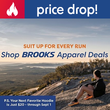 Graphic, a woman sitting on a rocky viewpoint looking out over a vast landscape wearing dark BROOKS running clothes and bright orange shoes, text, Suit Up for Every Run — Shop BROOKS Apparel Deals