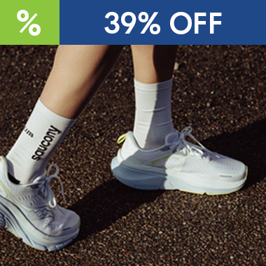 graphic, close-up of a person's legs walking on asphalt wearing white Saucony running shoes and white socks, text, Final price drop: SAUCONY Guide 18 Running Shoes for $91.95. Save 39%!