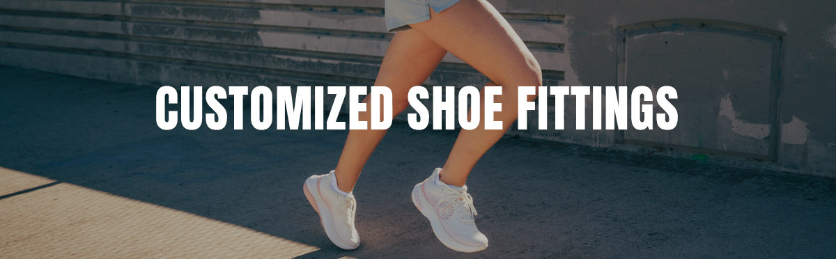 a woman wearing white running shoes with text customized shoe fittings