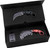 Halfbreed Blades Close Quarters fixed karambit and red true-weight steel trainer displayed inside an open presentation box