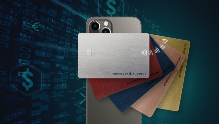 An image of a silver Arculus card with a black, geometric background