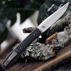 Boker Plus Urban Trapper Carbon Fiber 01BO733 back view highlighting the titanium liners and slim deep-carry pocket clip.