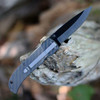 Boker Plus Anti-Grav 01BO036 macro shot of the black ceramic blade showing the nonmagnetic material and drop point tip.