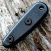 The ESEE Izula Optional Handle (IZULA-HANDLES-B) shown with its black G-10 scales, designed to attach to the Izula with Allen screws on both sides.