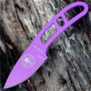 The ESEE Candiru Survival Kit (ESEE-CAN-PURP-KIT) shown with its 2.00-inch 1095 plain edge drop point blade in a Purple finish and flat grind, matching Purple skeletonized steel handle, white polymer sheath, and the full kit: paracord, cord lock, split rings, ferro rod, whistle, and snap hook.