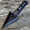The ESEE AH-1 Arrowhead (ESEE-AH1), a black traction-coated 1095 steel double-edged blade shown with its tang nubs and hole cutout for mounting to a stick.
