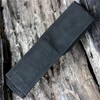 The ESEE Candiru Nylon Sheath (ESEE-CAN-SHEATH) in black nylon with a plastic liner, shown with its belt loop and hook & loop closure.