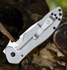 Kershaw Emerson CQC-6K D2 stainless steel frame lock and G-10 handle detail at Knifeworks.