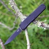 Boker Plus OTF Blackout 06EX263 automatic knife profile view showing black PVD 154CM clip point blade and black aluminum handle.
