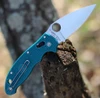 Spyderco Manix 2 LW Teal in open position showing the USA-made CPM SPY27 blade.