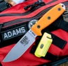 The ESEE-4 (ESEE-4P35V-OR) shown with its 4.5-inch CPM-S35VN drop point blade in a stonewash finish and flat grind, orange G-10 handle scales, and its injection-molded black polymer sheath.