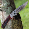 Benchmade 15085 Limited Edition Artist Series - Ringneck Pheasant (15085-2204) 3.40" CPM-S30V Satin Clip Point Embellished Blade, Wood Handle