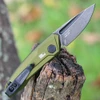 Kershaw Launch 9 being deployed showing the compact 5-inch overall length and deep-carry clip.