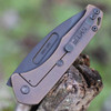Medford Knife & Tool Praetorian Slim Flipper Frame Lock (MD208SPD36A1)- 3.25" Black PVD CPM-S35VN Drop Point Blade, Bronze Tumbled Titanium Handle