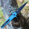 Kershaw Launch 8 being deployed via push button showing the symmetrical design and integrated finger guards.
