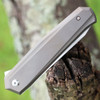 Kansept Integra (K1042A2) - 3.63" M390 Satin Drop Point Plain Blade, Bronze Anodized Titanium Handle