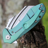 Kansept KTC3 (K1031A4) - 2.69" CPM-S35VN Stonewashed Hawkbill Plain Blade, Green Anodized Titanium Handle