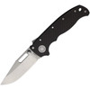 The Demko AD20.5 Shark Lock open, showing its 3.25-inch stonewashed CPM-S35VN clip point blade, carbon fiber scales over steel liners, the spine-mounted Shark-Lock fin, a thumb stud and thumb hole, and a tip-up pocket clip.