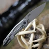 Reverse side of the ZT 0545 showing the tumbled titanium frame lock and reversible deep-carry pocket clip.