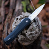 Rear view of the 9000CF showing the black anodized aluminum back handle and reversible deep-carry pocket clip.