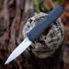 Kershaw Livewire 9000CF OTF automatic knife profile view showing the 3.35-inch two-tone MagnaCut blade and carbon fiber handle.
