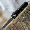 Microtech UTX-85 S/E (MCT23111AP) 3.125" Premium Steel Apocalyptic Finished Drop Point Partially Serrated Blade, Black Handle