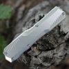 Close-up of the raw 6061-T6 aluminum handle and the staircase-style thumb slide on the Kershaw 9000RAW.