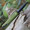 The Kershaw Livewire Dagger being deployed highlighting the snappy double-action OTF mechanism.