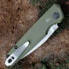 Rear view showing the reversible black deep-carry pocket clip and the integrated backspacer on the 7551OL.
