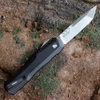 Rear view showing the reversible black deep-carry pocket clip and the "Made in USA" marking on the aluminum back handle.