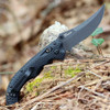 Black Cerakote partially serrated CPM-S90V Scimitar blade