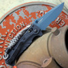 Blue Titanium Cerakote finished CPM-MagnaCut partially serrated blade