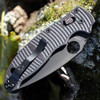 Spyderco Manix 2 Salt C101GMCBKP2 black textured G-10 handle open view showing black DLC CPM MagnaCut plain blade