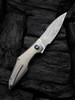 WE Knives - Krait Snake Flipper Knife (WE24084-DS1) 3.34" Fafnir Damasteel/Recurve Tip Harpoon Blade, Gray 6AL4V Titanium Handle, Gray Nested Liner Lock, "Flamed" Spacer